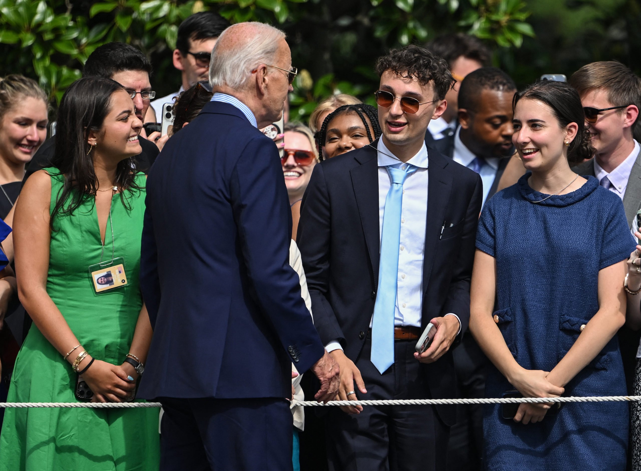 US President Joe Biden speaks with White House staffers as he walks to board Marine One from the South Lawn of the White House in Washington, DC, on August 16, 2024. Biden is traveling to Philadelphia before going to Camp David for the weekend. (Photo by ANDREW CABALLERO-REYNOLDS / AFP) (Photo by ANDREW CABALLERO-REYNOLDS/AFP via Getty Images)